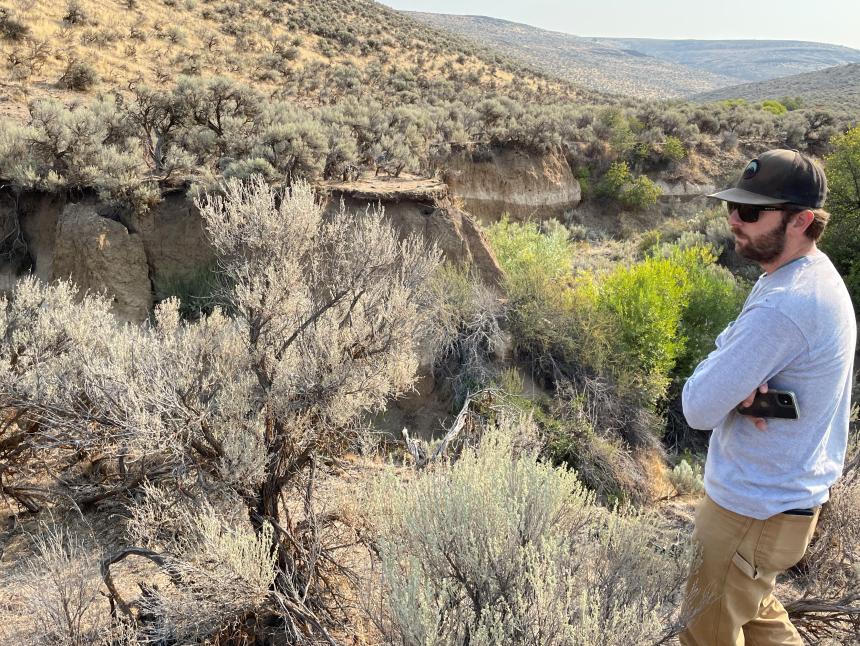 Wildlife Area Manager Morrison contemplating deep incision in lower Whiskey Jim pasture