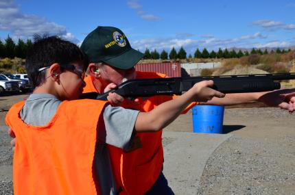 Teen practices shooting with help of master hunter