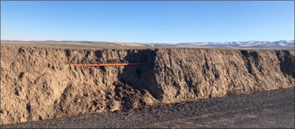 An exposed conduit in a collapsed dirt side