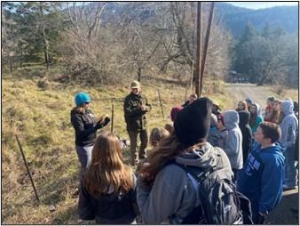 Biologist Wickhem speaking to students.