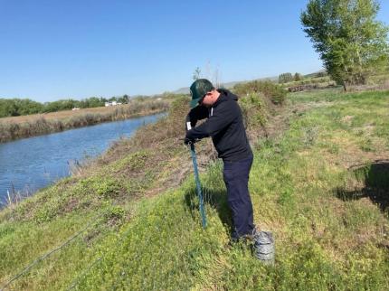 Garcia removing a trailer from Lavender Lake.