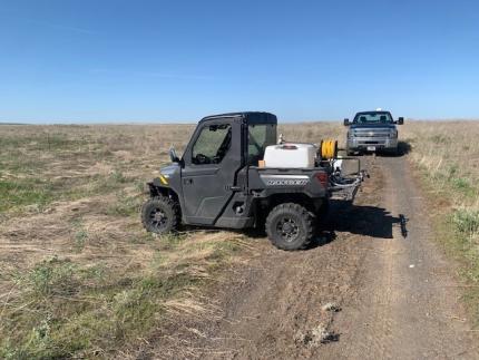 An ATV in a field.