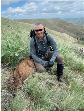 Wik with a collared calf ready for release