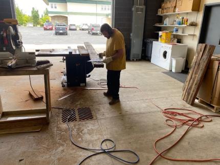 Water Access Area staff members Dziekan and Brant making repairs on the boat ramp.