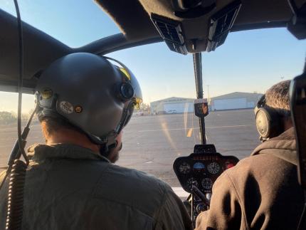 Biologist Dougherty and pilot James Dawe ready for takeoff.