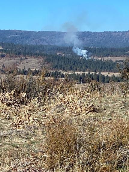 Wildfire smoke in the distance.