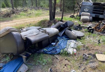 Large garbage dumping location on private industrial timberland in Klickitat County.