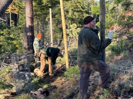 Meisner, Hammons, and Woodall making elk fence repairs at the Weatherly Unit. The sun finally came out!  