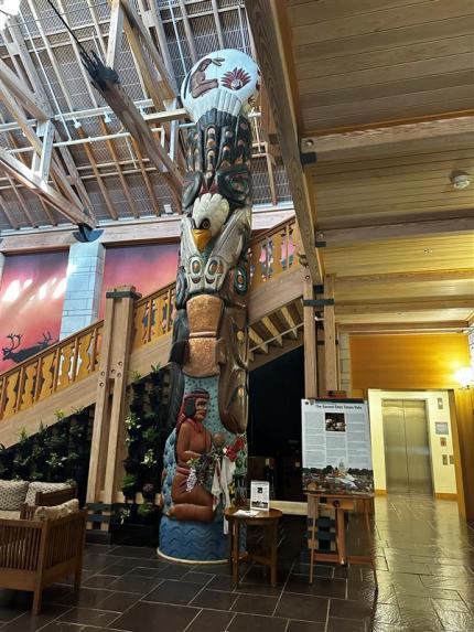 A totem pole inside a building