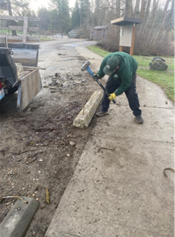 Replacing parking blocks at Eloika Lake.